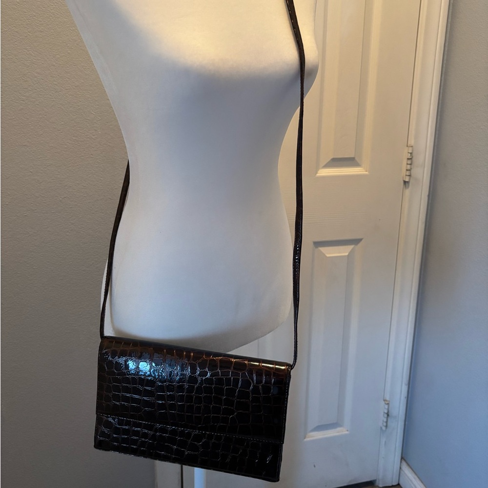 Nordstrom brand shoulder purse. Brown with animal print detailing